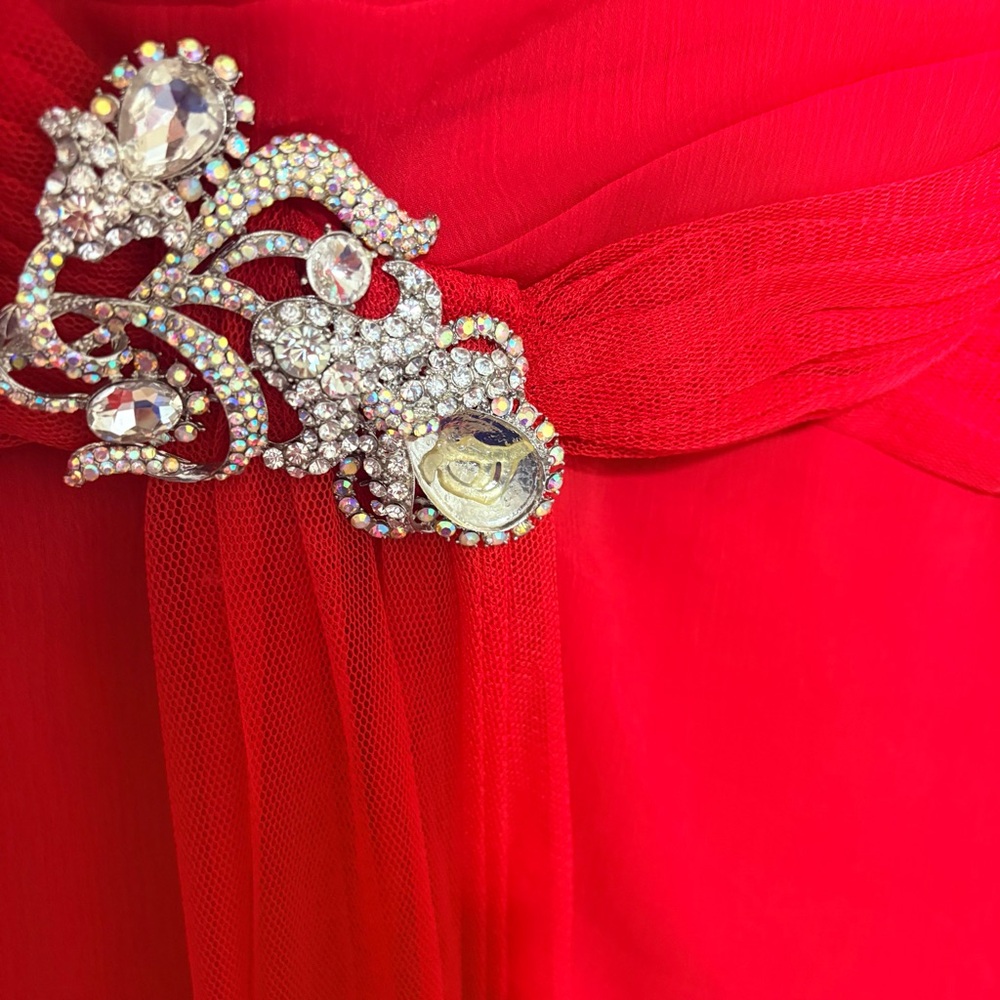Red strapless gown is a Faviana style 7131 formal dress - Picture 4 of 9